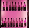 Two shelves of wine bottles illuminated by pink light. Náhľad obrázku produktu