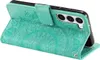 A teal flip case for a Samsung Galaxy S23 phone, showing the embossed mandala pattern and the camera cutout. Produktbild-Vorschau