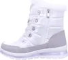 A side view of a white and gray winter boot. Produktbild-Vorschau