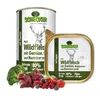 Two cans of Schecker dog food with ingredients like wild meat, vegetables, berries, and broccoli. Produktbild-Vorschau