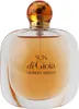 A perfume bottle with a clear glass body and an orange cap. Produktbild-Vorschau
