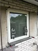 A window being installed with specialized tools. Produktbild-Vorschau