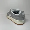 A rear view of a single Adidas Campus 00s sneaker against a plain background. Náhled obrázku produktu