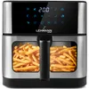 A close-up studio shot of a dual-basket air fryer filled with french fries. Podgląd zdjęcia produktu