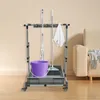 A cleaning tool organizer stand with a mop, broom, bucket, and cloth. Podgląd zdjęcia produktu
