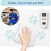 A woman interacting with a cat, with a pet training mat and a cleaning cloth shown. Produktbild-Vorschau