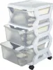 A white and transparent plastic drawer unit with three drawers and wheels. Anteprima dell’immagine prodotto