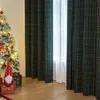 A Christmas tree and gifts are set up next to plaid curtains. Podgląd zdjęcia produktu