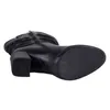The image shows the sole and heel of a black boot. Podgląd zdjęcia produktu