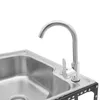 A close-up view of a stainless steel sink with a faucet. Podgląd zdjęcia produktu