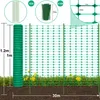 A green fence roll and erected fence sections in a grassy area with some yellow flowers. Produktbild-Vorschau