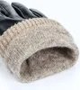 Close-up of the cuff of a black leather glove with a knitted lining. Produktbild-Vorschau