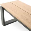 A close-up view of a modern outdoor dining table with a wood-look top and black metal legs. Produktbild-Vorschau