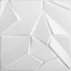 A white, geometric 3D wall panel with sharp angles and facets, presented against a plain white background. Anteprima dell’immagine prodotto