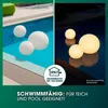 Floating spheres in a pool, some lit at night, with a certification icon and text. Anteprima dell’immagine prodotto
