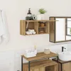A bathroom setting with a wall-mounted cabinet and vanity. Anteprima dell’immagine prodotto