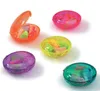 Five colorful, oval-shaped containers of earplugs are arranged on a white background. Produktbild-Vorschau
