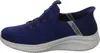 A side view of a blue Skechers slip-on shoe with a speckled gray sole. Produktbild-Vorschau