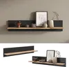 A collage of two images showing a wooden shelf with decorative items on a gray wall. Produktbild-Vorschau