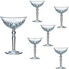 A collection of crystal champagne glasses with intricate cut designs. Produktbild-Vorschau