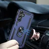 A hand holding a blue phone case with a ring holder, near a magnetic car mount attached to a car air vent. Produktbild-Vorschau