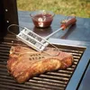 A steak is being branded on a grill with a branding iron. Náhľad obrázku produktu