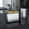 A modern kitchen counter with a toaster and a kettle. Podgląd zdjęcia produktu