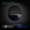 A round LED mirror with touch controls in a bathroom setting. Voir les images du produit