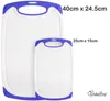 Two white cutting boards with blue trim are shown side-by-side on a white background. Text indicating dimensions and a brand logo are present. Anteprima dell’immagine prodotto