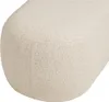 A close-up view of a textured, cream-colored fabric surface. Voir les images du produit