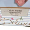 A close-up of a product box with text and decorative elements. Produktbild-Vorschau