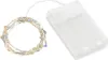 A string of multicolor LED lights coiled next to a clear plastic battery case. Produktbild-Vorschau