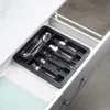 A cutlery organizer in an open drawer. Produktbild-Vorschau