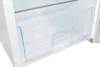 Close-up view of an empty clear plastic drawer inside a white refrigerator. Produktbild-Vorschau