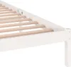 Close-up of a white wooden bed frame with wooden slats. Voir les images du produit