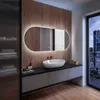 A modern bathroom with a vanity, sink, and a large illuminated mirror. Produktbild-Vorschau
