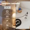 A close-up view of a bedside table with a lamp and a charging station, showcasing product features. Produktbild-Vorschau