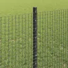 A close-up view of a fence post and mesh fencing in a grassy field. Podgląd zdjęcia produktu