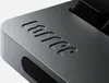 A close-up view of the textured surface of a gray mechanical keyboard, showing engraved lettering. Produktbild-Vorschau