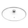 A clear, studio shot of a glass pot lid with a silver handle, isolated on a white background. Podgląd zdjęcia produktu