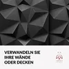 A close-up of a textured black geometric wall panel with text and a logo below. Produktbild-Vorschau