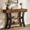 A rustic-style console table with shelves, decorated with a vase of flowers, books, and a basket of decorative items. Anteprima dell’immagine prodotto