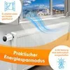 A radiator with a smart thermostat attached, shown in a room with a window overlooking a suburban landscape. Produktbild-Vorschau