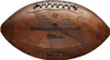 A close-up studio shot of a brown American football with gray laces. Náhľad obrázku produktu