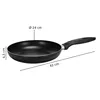 A black frying pan with measurement indicators. Produktbild-Vorschau