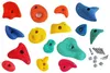 A collection of colorful climbing holds and hardware laid out on a white background. Produktbild-Vorschau