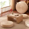 A living room scene with tatami cushions and a coffee table. Produktbild-Vorschau