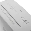 A close-up view of the top of a white paper shredder, showing the input slots and control panel. Anteprima dell’immagine prodotto