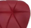 A close-up view of the quilted upholstery of a bordeaux bar stool. Náhled obrázku produktu