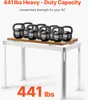 A white AC stand is shown with several 50lb weights on top to demonstrate its heavy-duty capacity. Anteprima dell’immagine prodotto